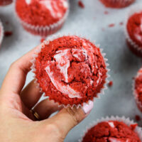 image of red velvet muffins with cream cheese swirl