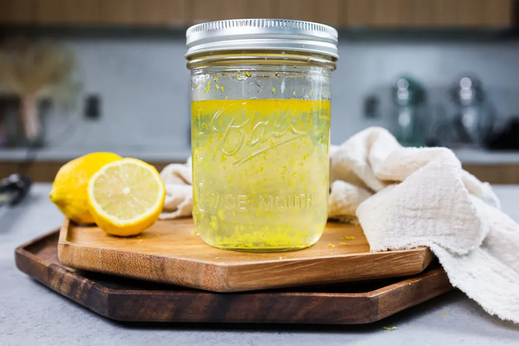 image of lemon simple syrup stored in a mason jar for easy storage