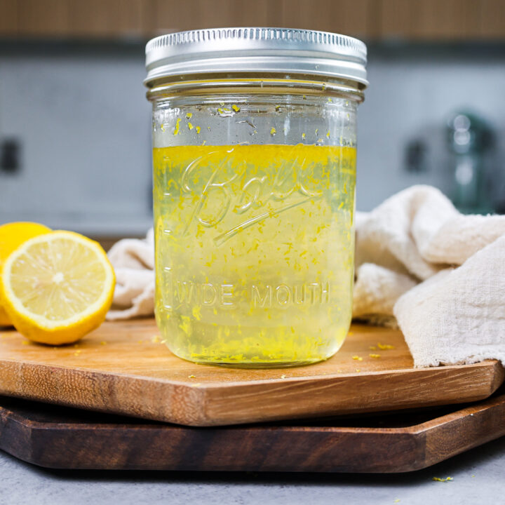 image of lemon simple syrup stored in a mason jar for easy storage