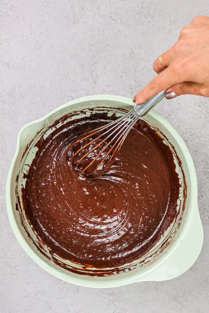 image of moist chocolate cake batter being mixer together