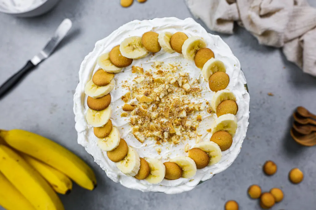 image of a banana pudding trifle made and decorated with fresh banana slices and mini nilla wafers