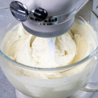 image of vanilla buttercream being mixed in a kitchen aid mixer