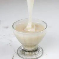 image of vegan sweetened condensed milk made with coconut sugar and vegan sugar