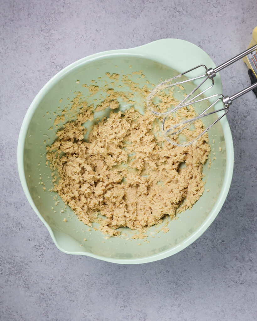 image of butter and sugar that's been creamed together to make cookie dough