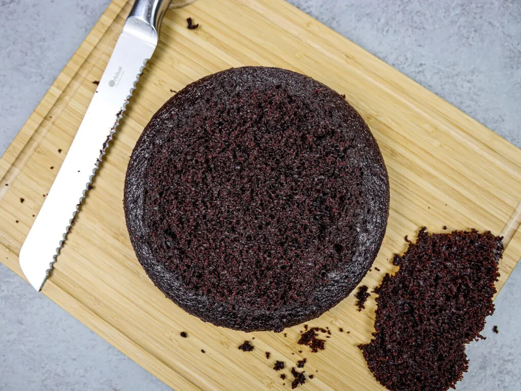 image of a moist chocolate cake layer that's been leveled with a serrated knife to make the cake easier to stack