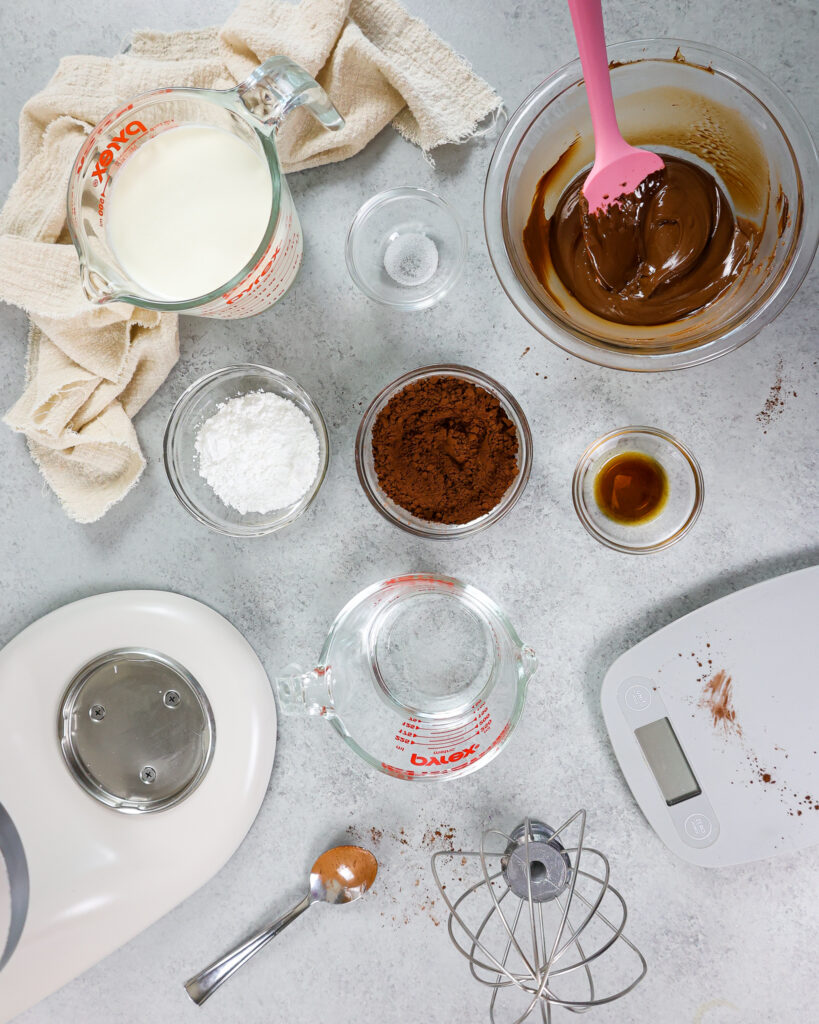 image of ingredients laid out to make a dark chocolate mousse cake filling