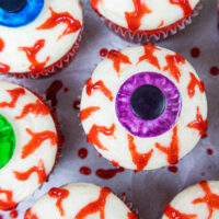 image of halloween eyeball cupcakes made with edible blood veins and red velvet cupcakes