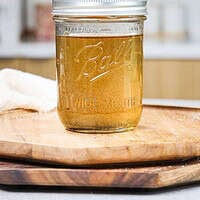 image of vanilla bean simple syrup in a mason jar