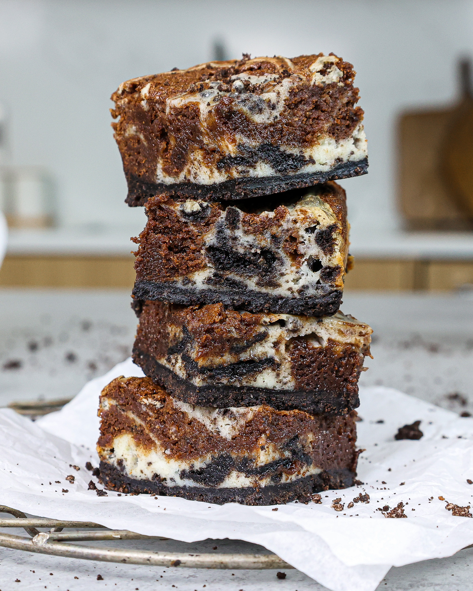 image of oreo cheesecake brownies stacked on top of each other