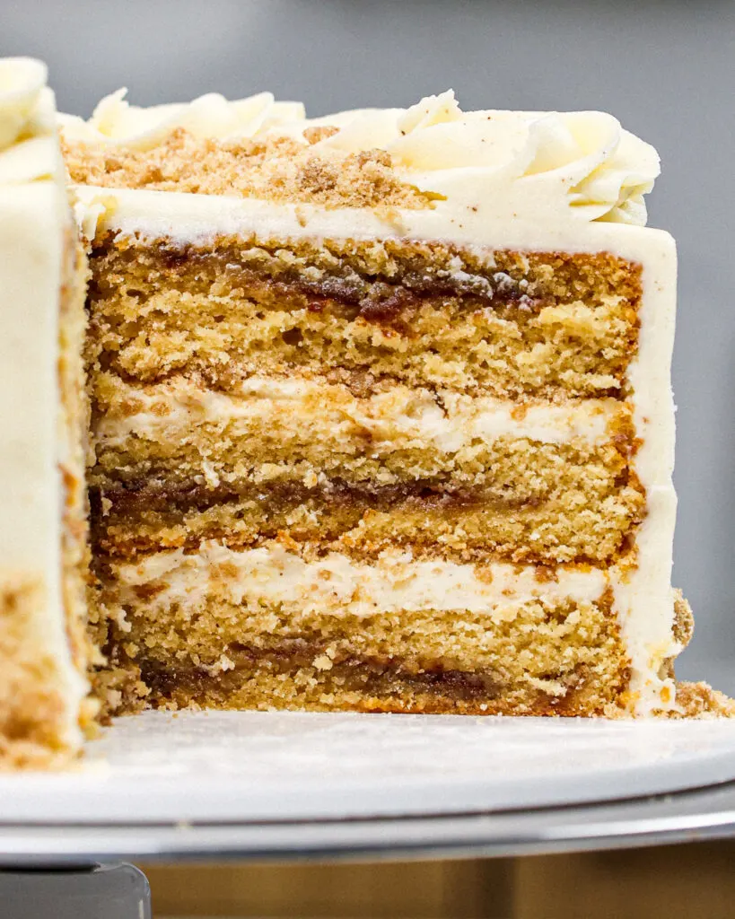 image of a cross section of a coffee cake layer cake that's frosted with brown butter frosting
