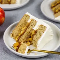 image of a slice of salted caramel apple cake on plate
