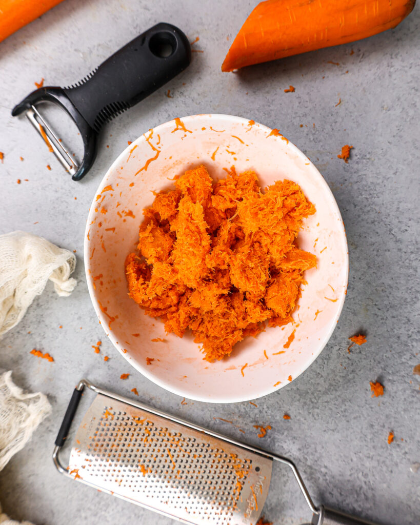image of finely shredded carrots grated using a microplane grater