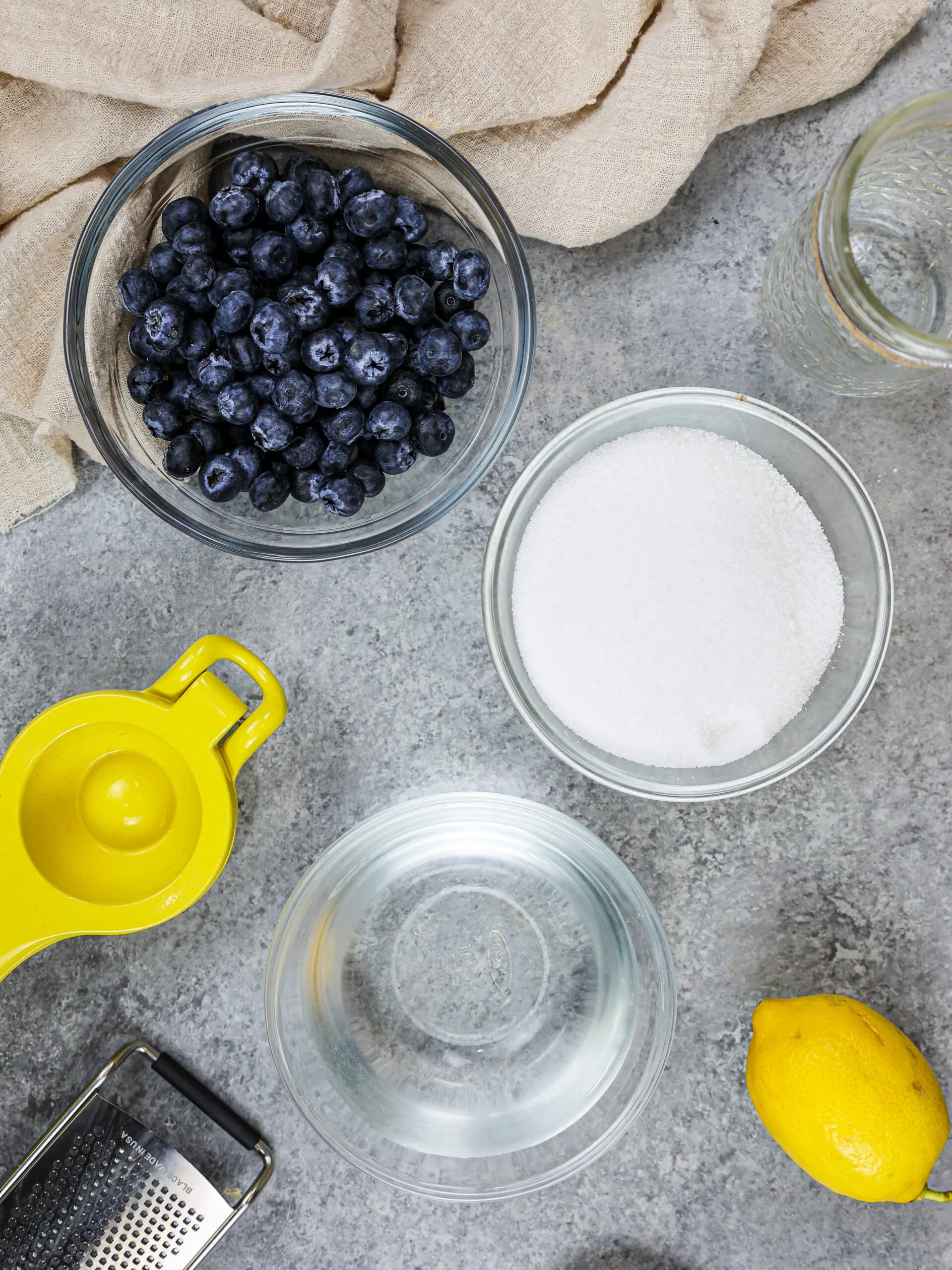 image of ingredients laid out to make blueberry simple syrup