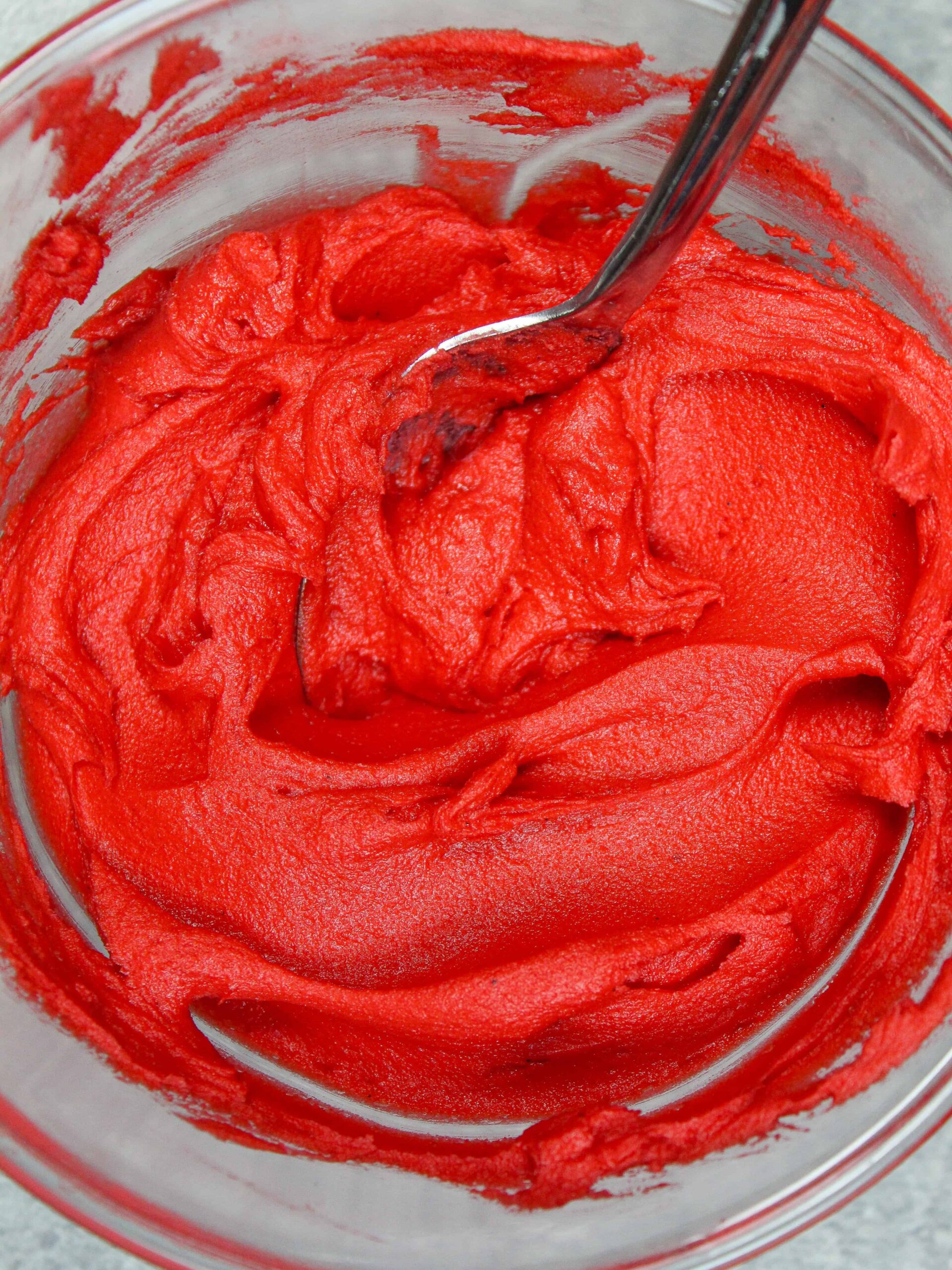 close up photo of bright red buttercream
