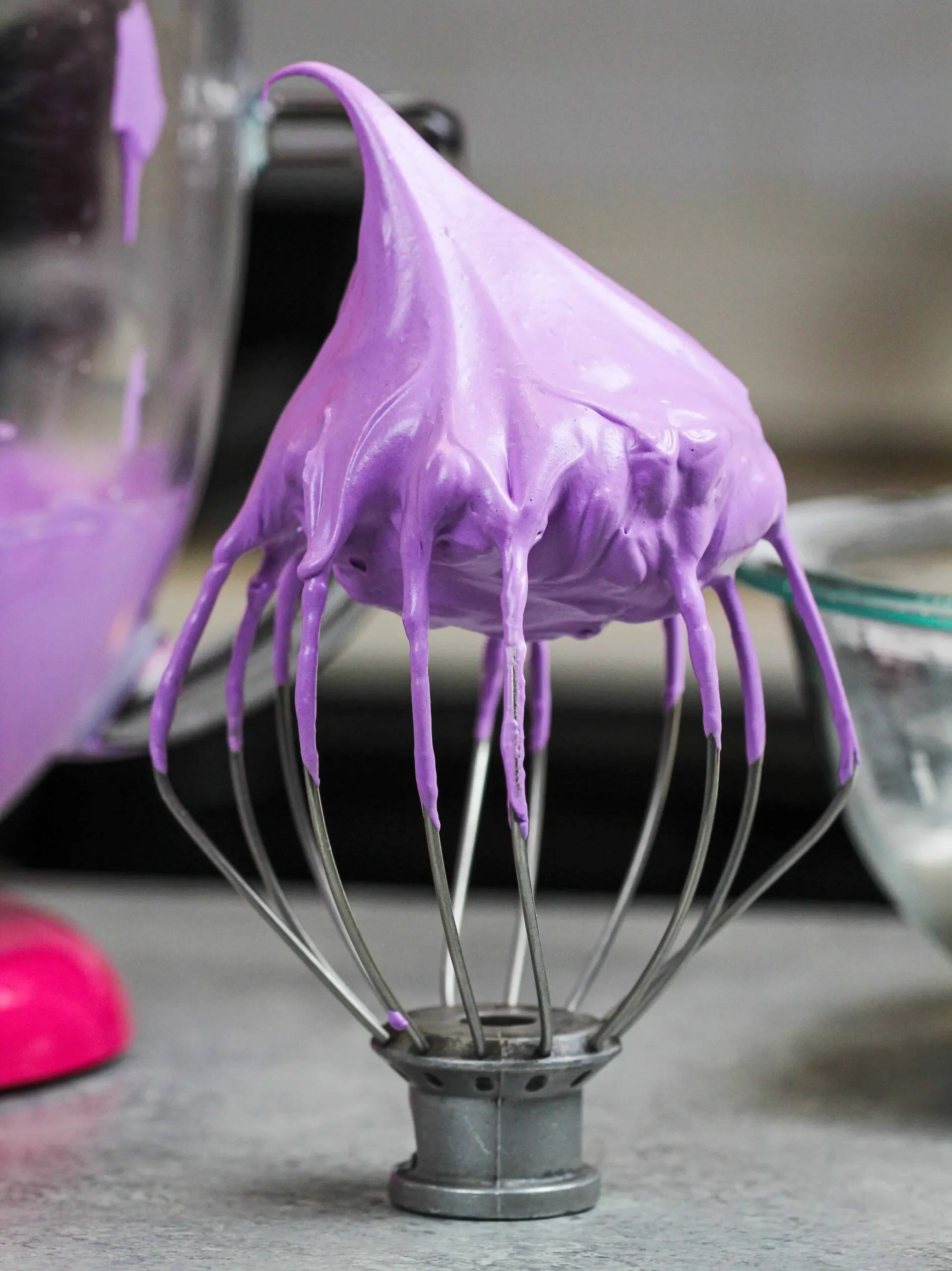 image of french meringue that's been colored purple with gel food coloring to make lavender macarons