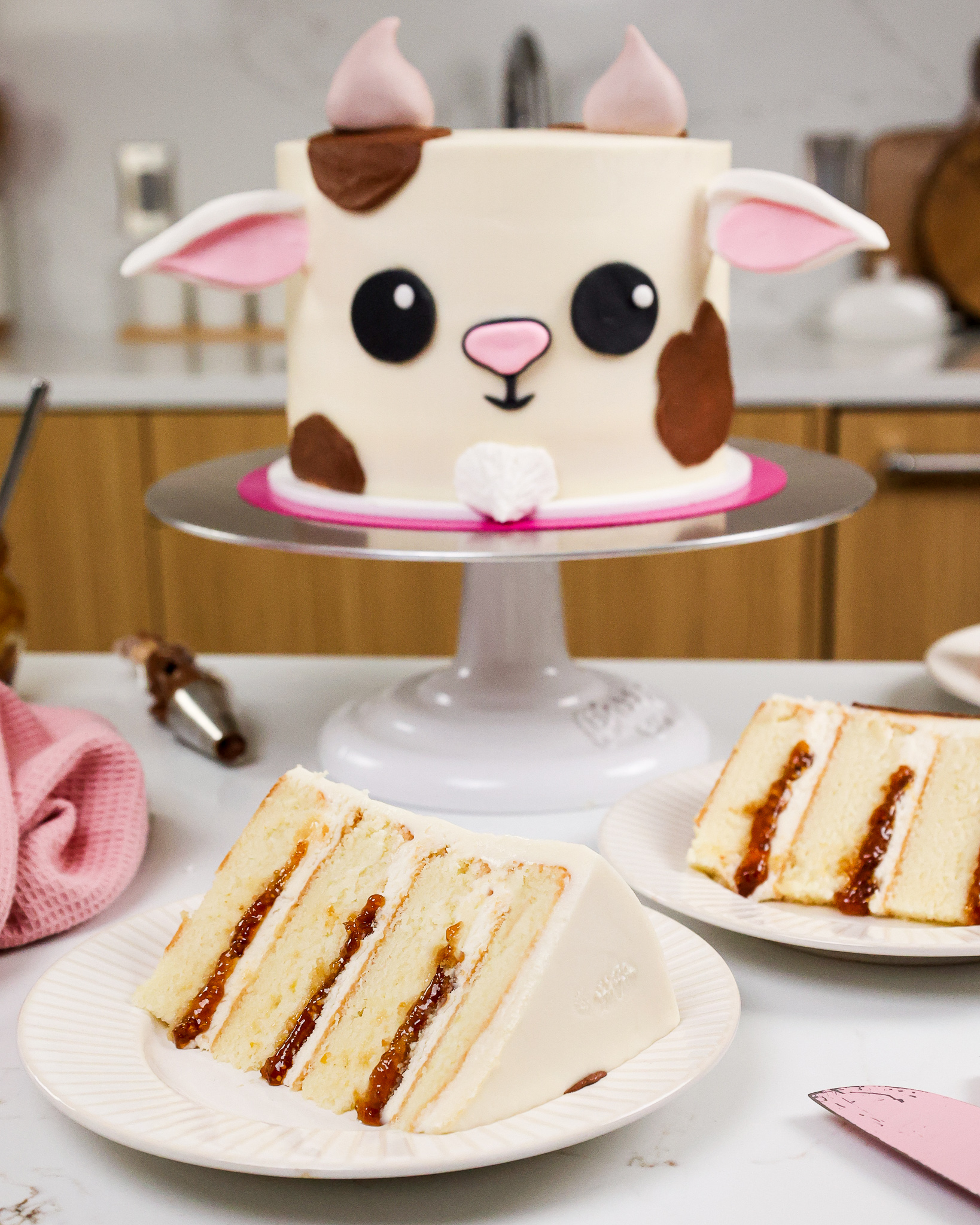 image of a goat cake made to look like a cute little goat and filled with goat cheese frosting and fig jam