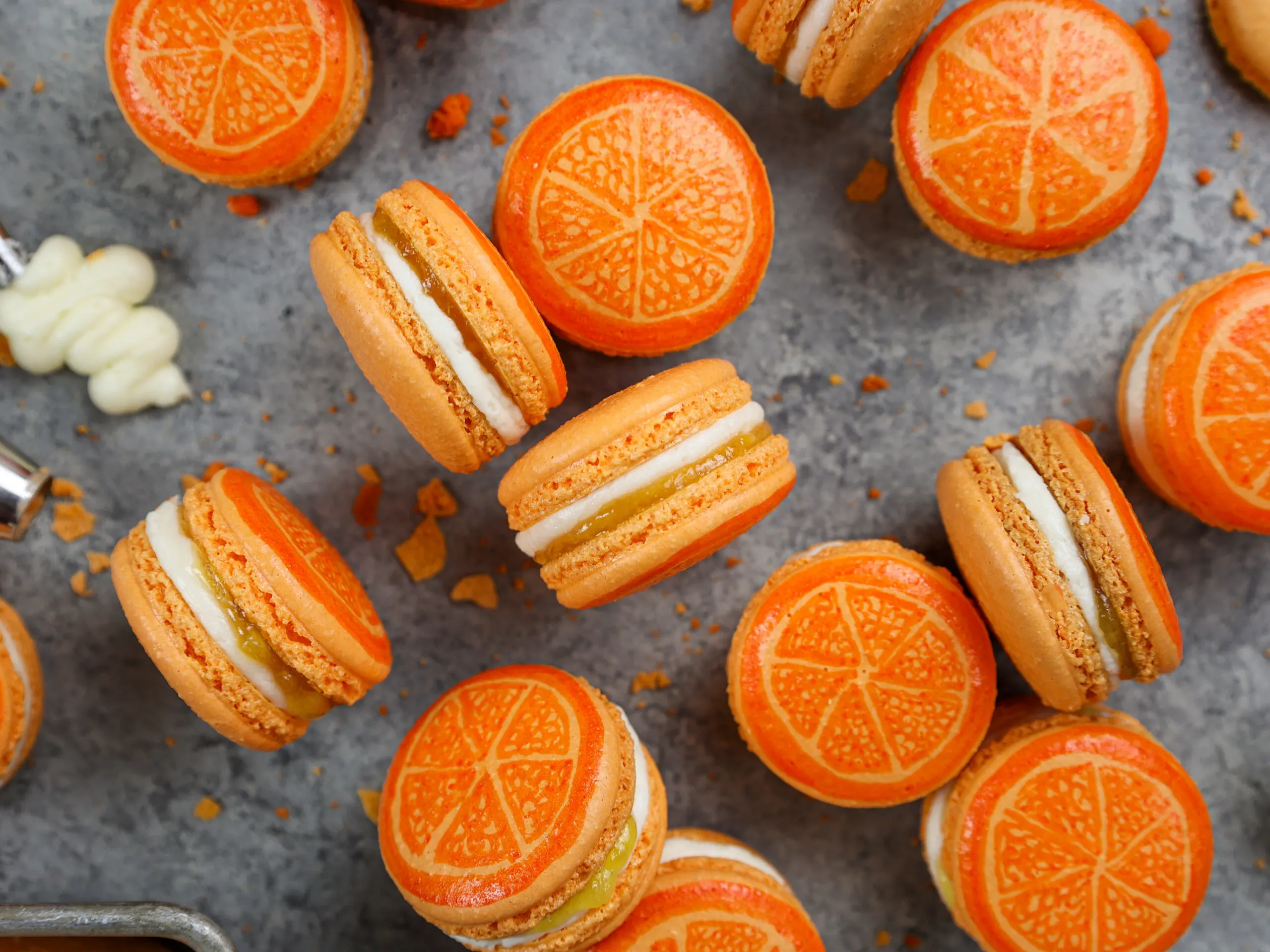 image of adorable orange macarons filled with orange marmalade and buttercream