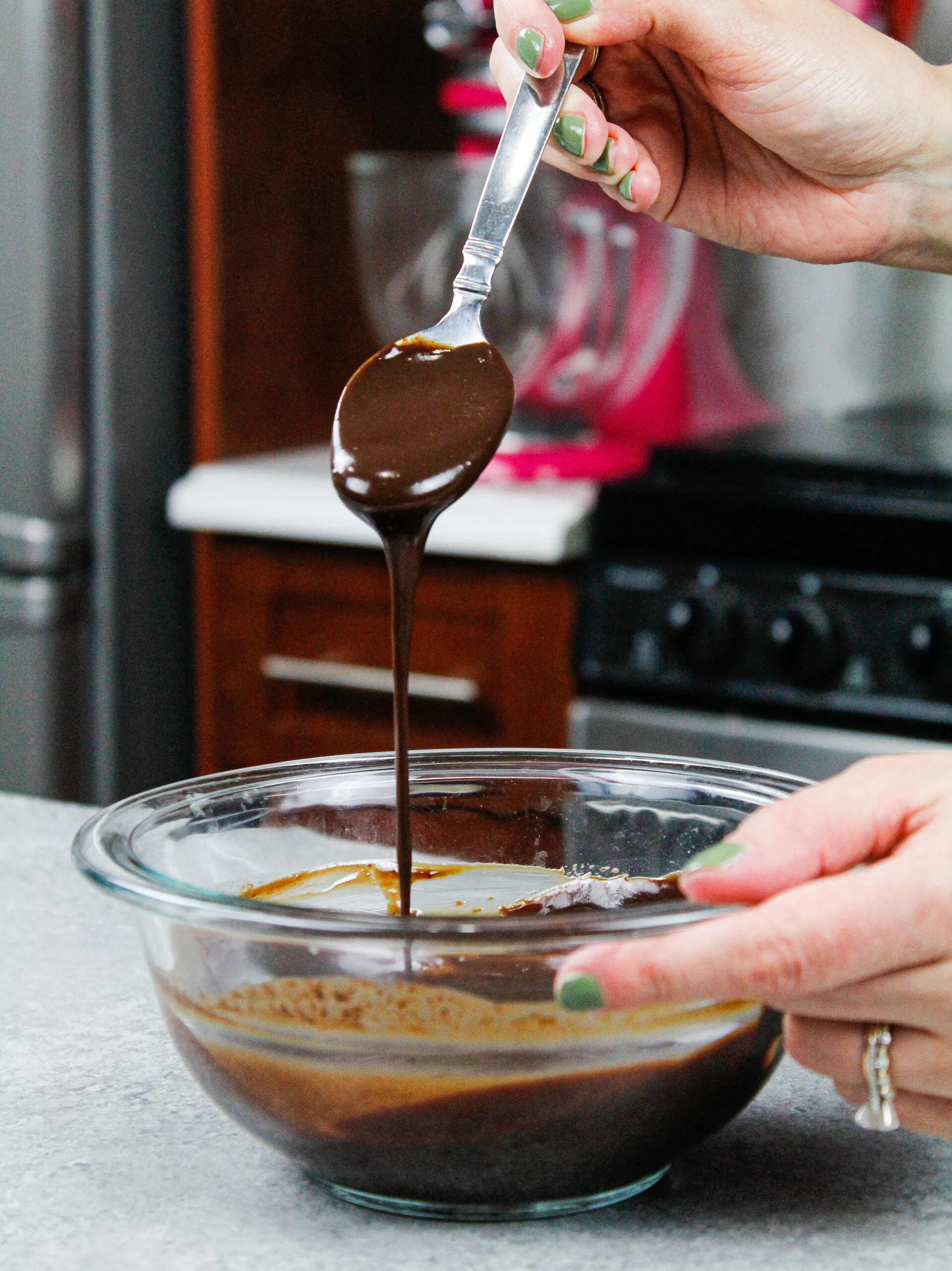 image of chocolate ganache being made in a glass bowl