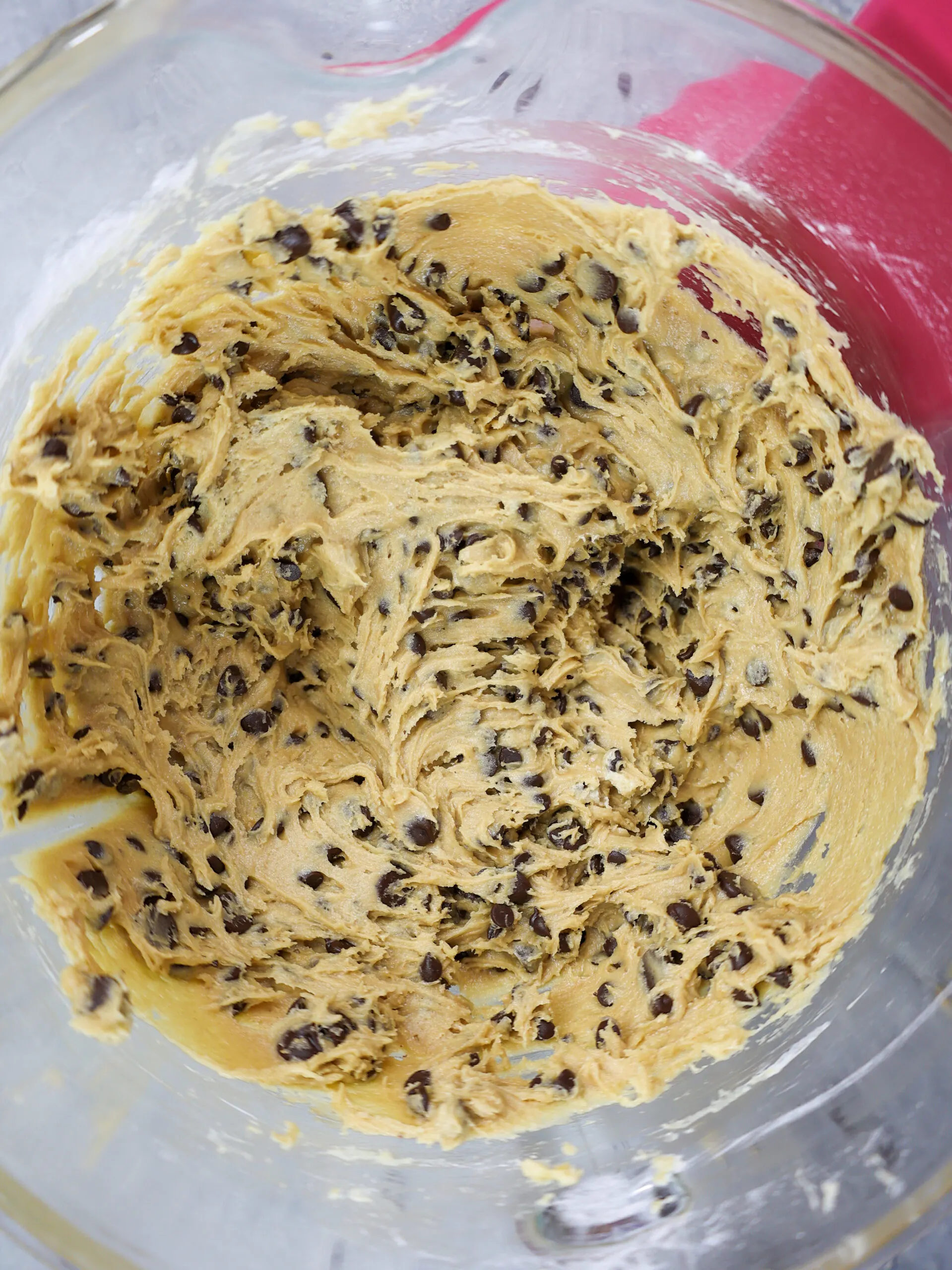 image of cream cheese chocolate chip cookie dough that's been mixed and is ready to be chilled in the fridge.