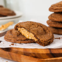 image of Peanut Butter Stuffed Chocolate Cookies that have been cut in half to show the filling
