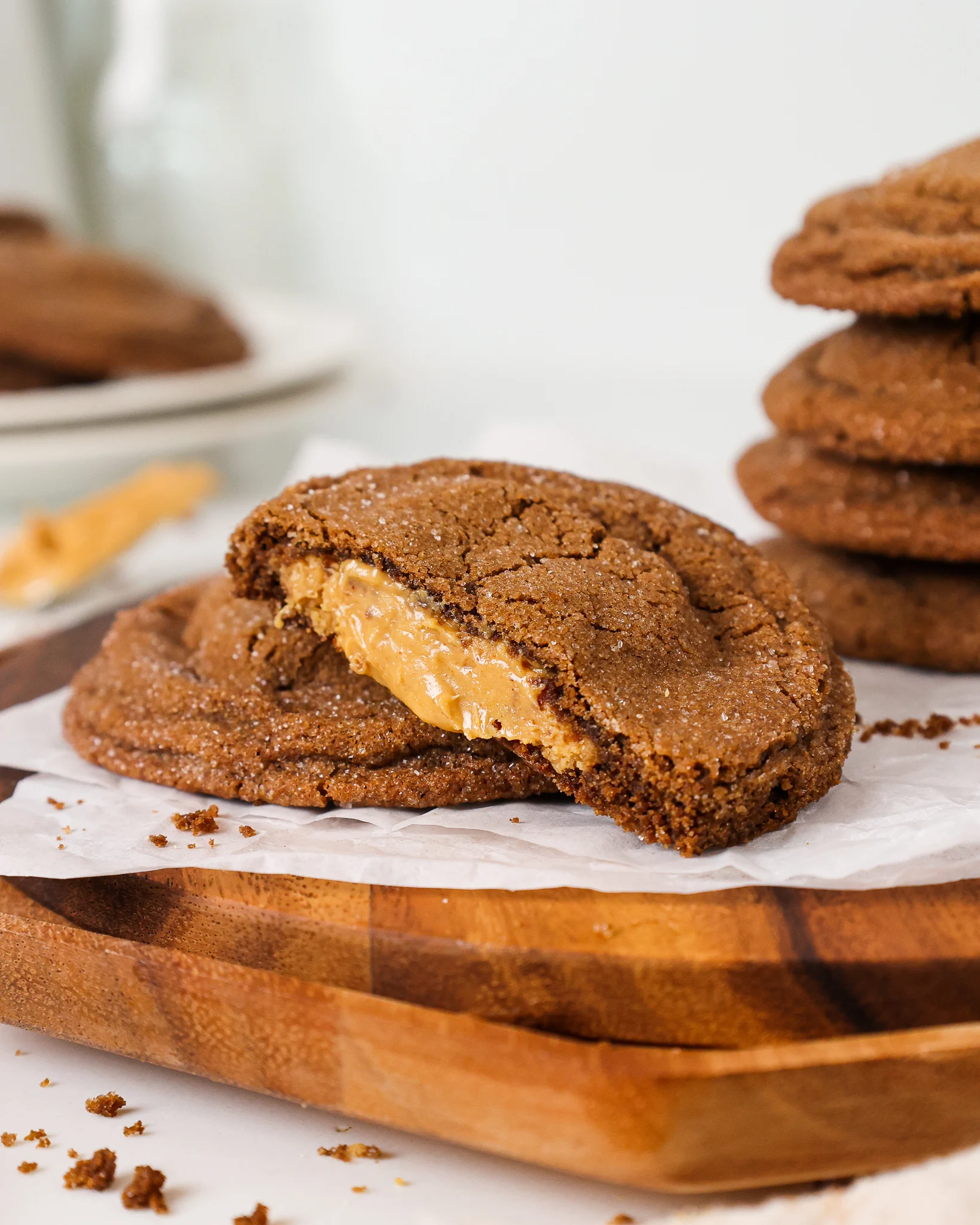 image of Peanut Butter Stuffed Chocolate Cookies that have been cut in half to show the filling