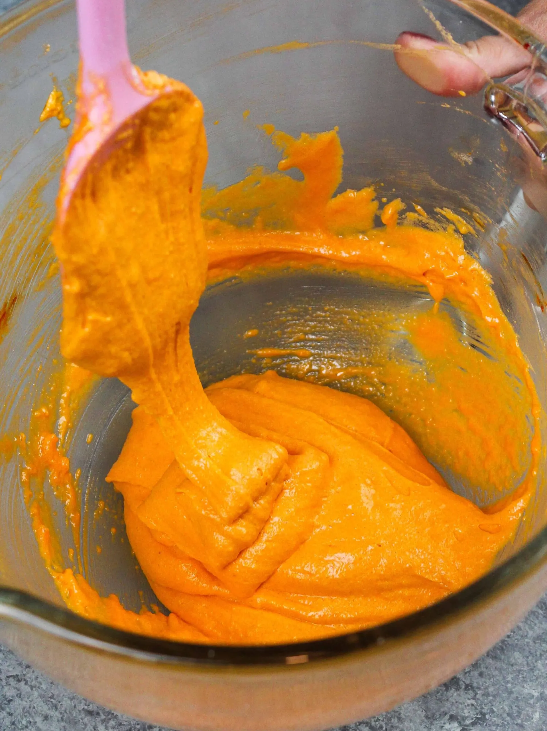 image of orange macaron batter