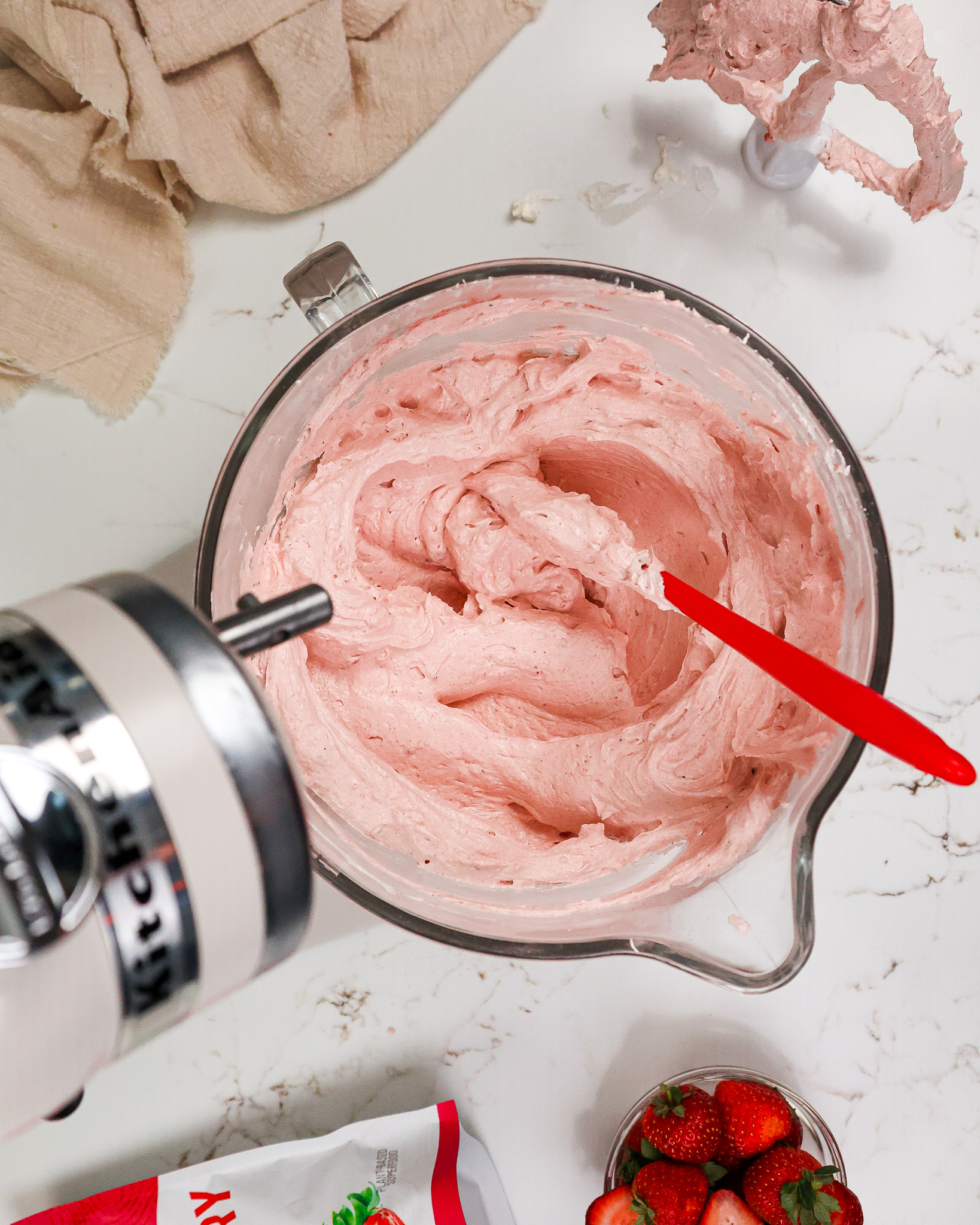 image of strawberry swiss meringue buttercream in a mixing bowl