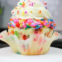 image of a cute funfetti sprinkle cupcake that's been unwrapped