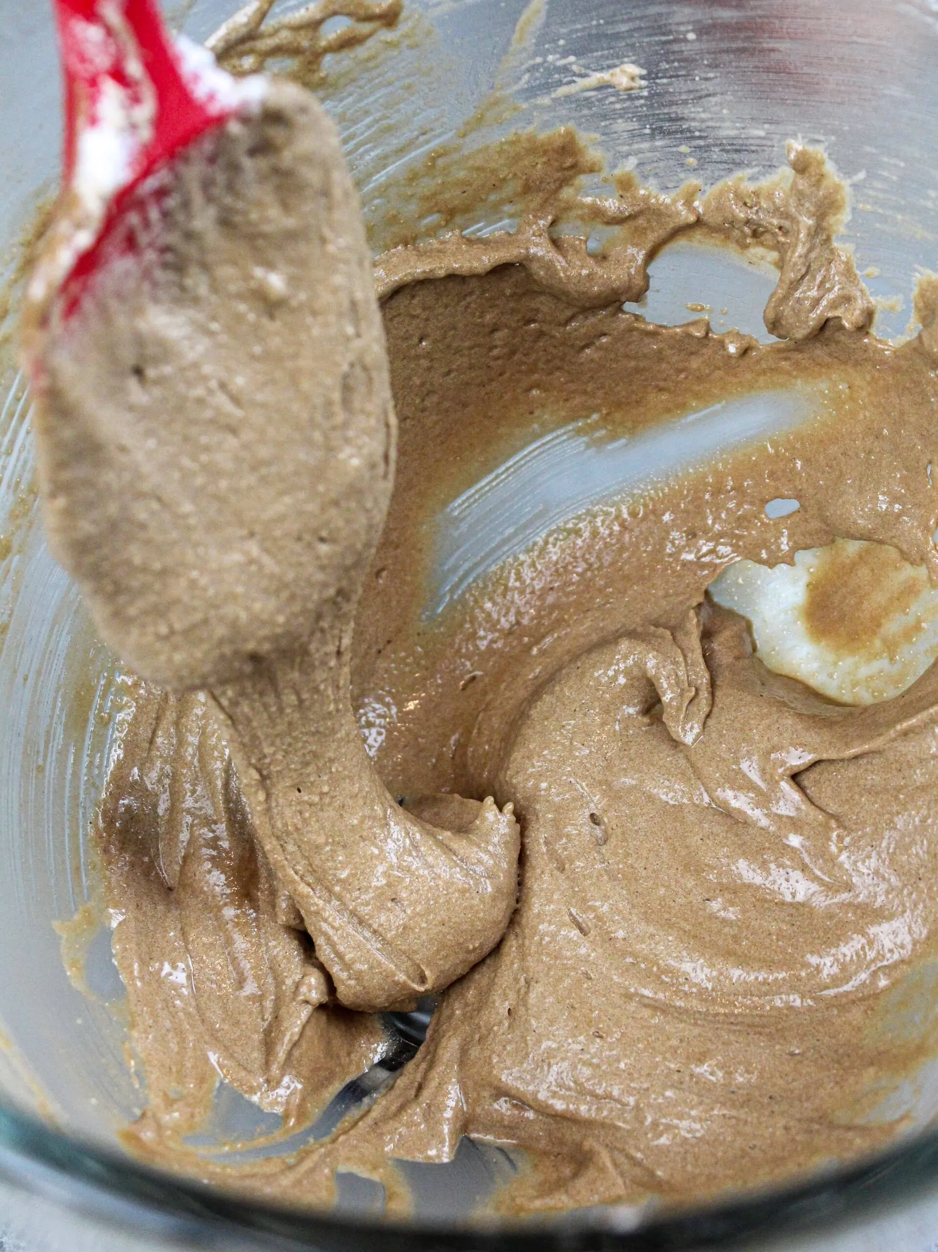 image of chocolate macaron batter ready to be piped