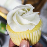 image of vegan buttercream frosting piped onto a cupcake