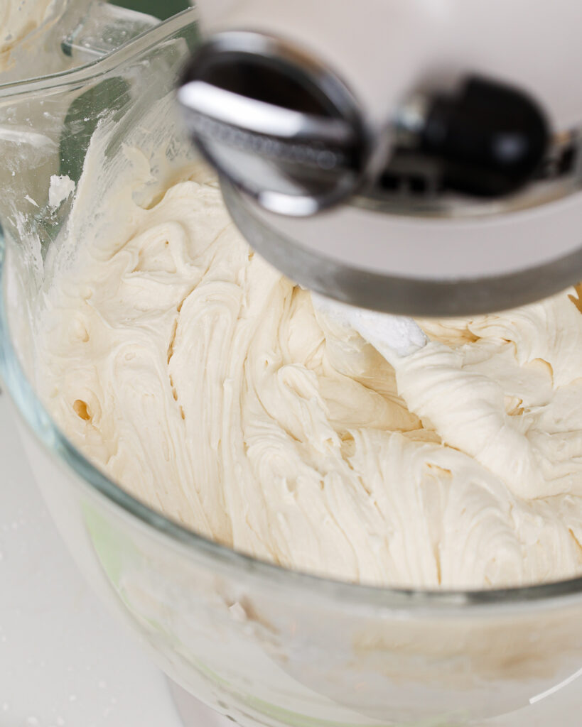 image of cream cheese buttercream frosting in a mixer bowl