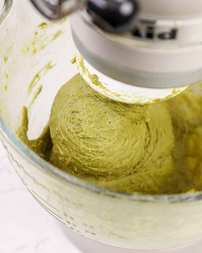 image of matcha dough that's been mixed together using a stand mixer