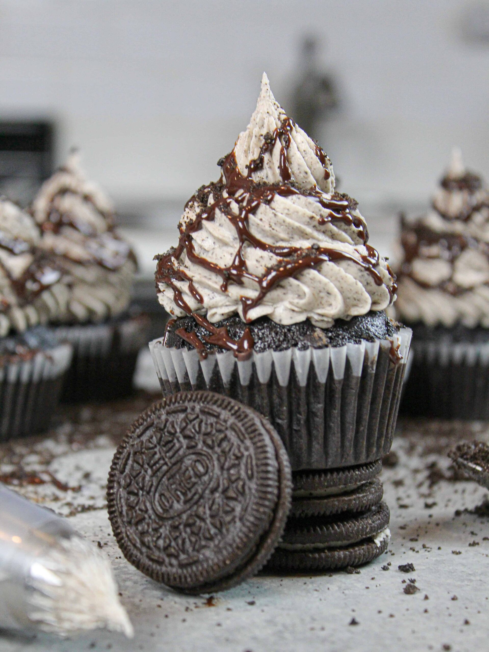 image of oreo cupcake stacked on top of two oreos