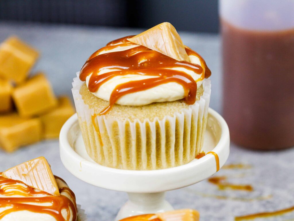 image of caramel cupcakes filled with chewy caramel and topped with salted caramel frosting