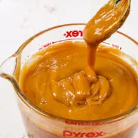 image of thick caramel cake filling that's been cooled and has thickened and is ready to be added to a cake