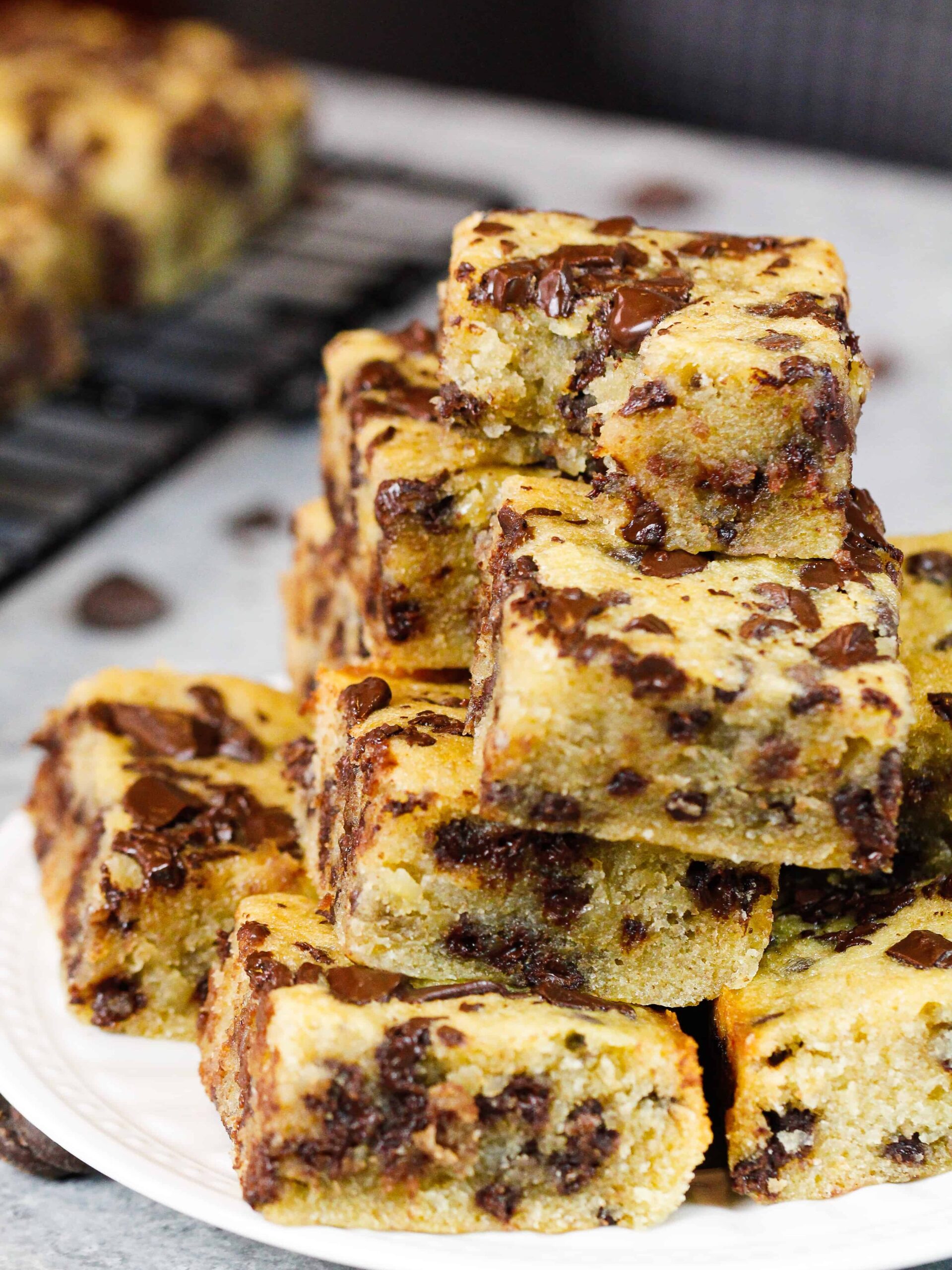 image of pile of banana chocolate chip bars stacked on a plate