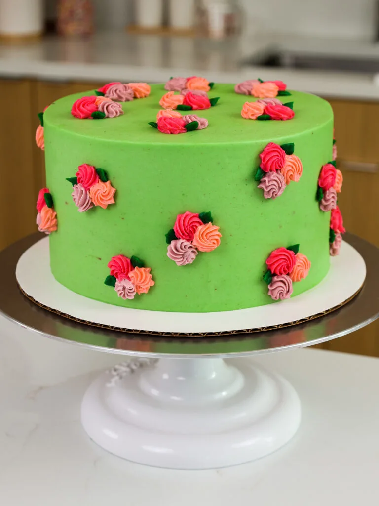 image of a strawberry cake frosted with a buttercream that's not too sweet