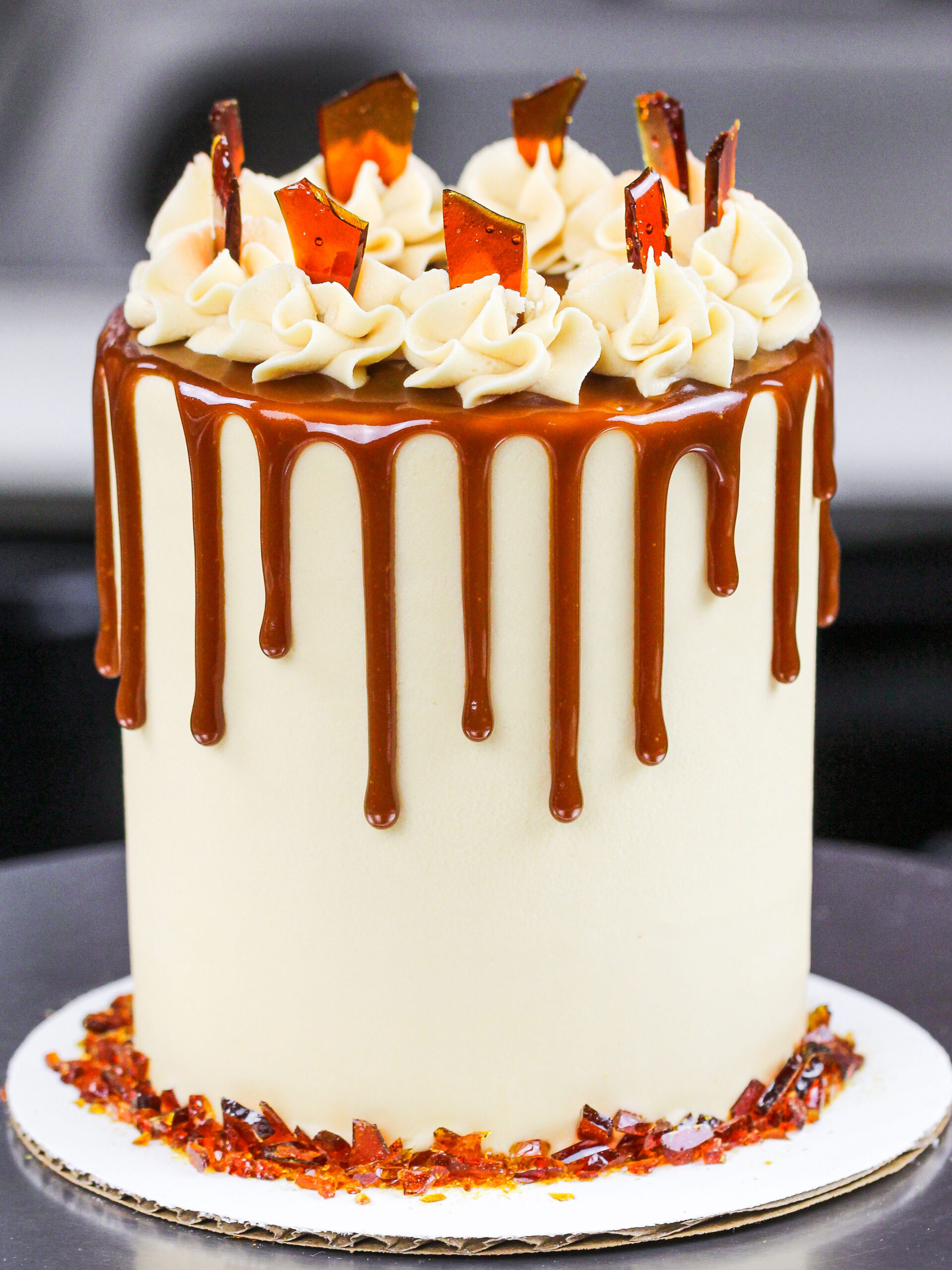 image of a mini brown sugar caramel drip cake made with 4-inch cake layers
