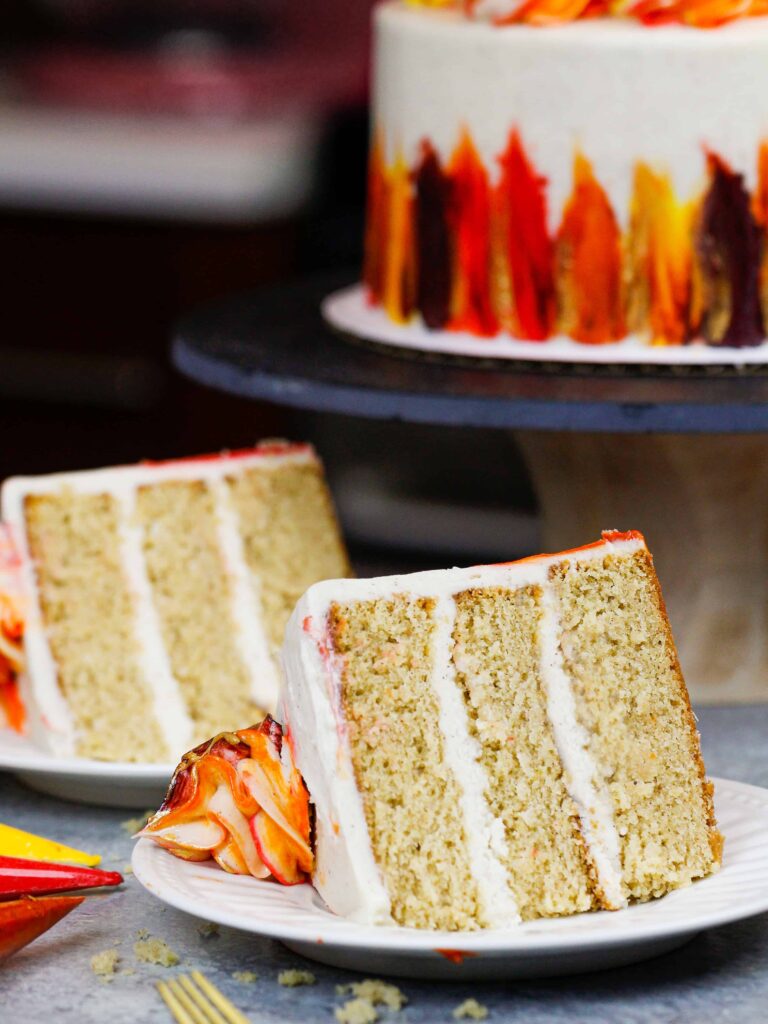 image of a layered spice cake that's been cut to show how moist and delicious the cake is