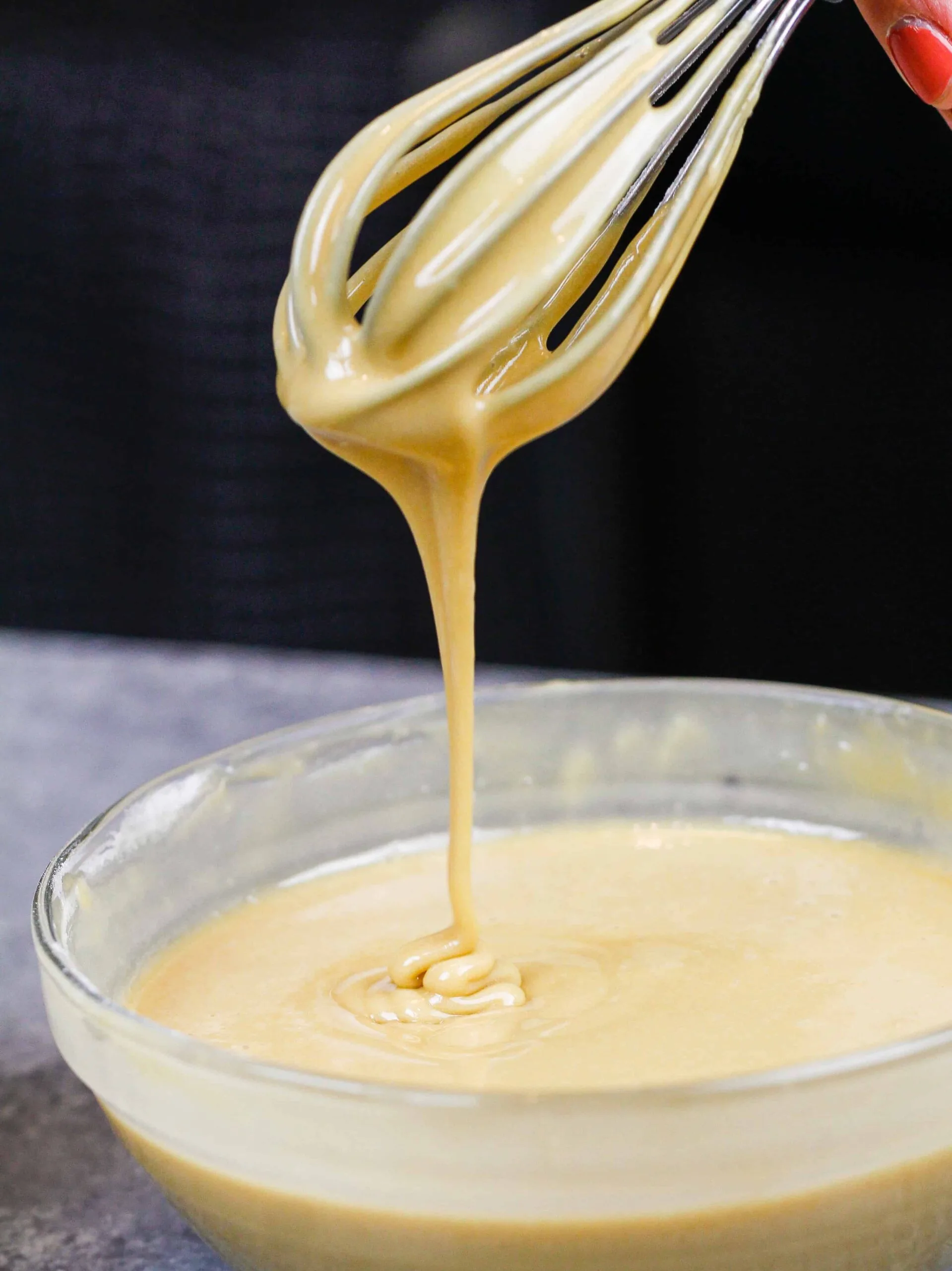 image of coffee glaze on a whisk