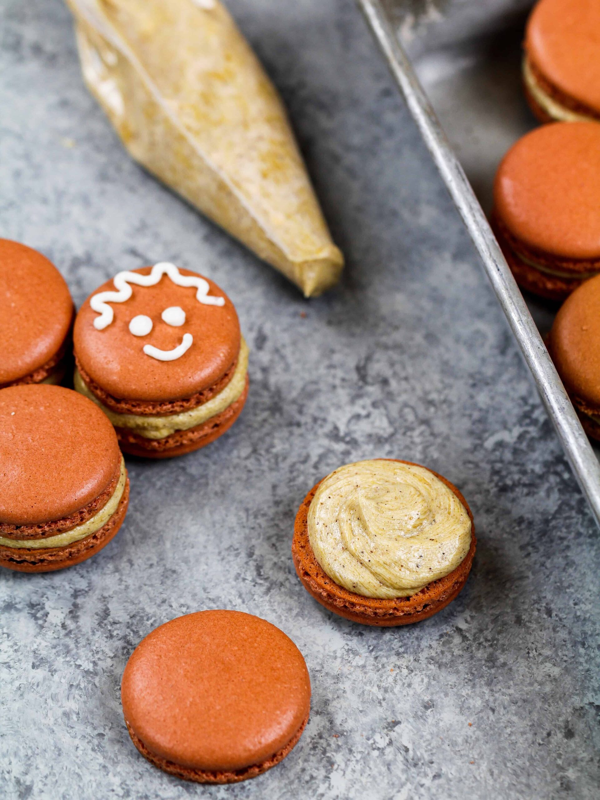image of brown french macarons filled with gingerbread buttercream to make gingerbread macarons