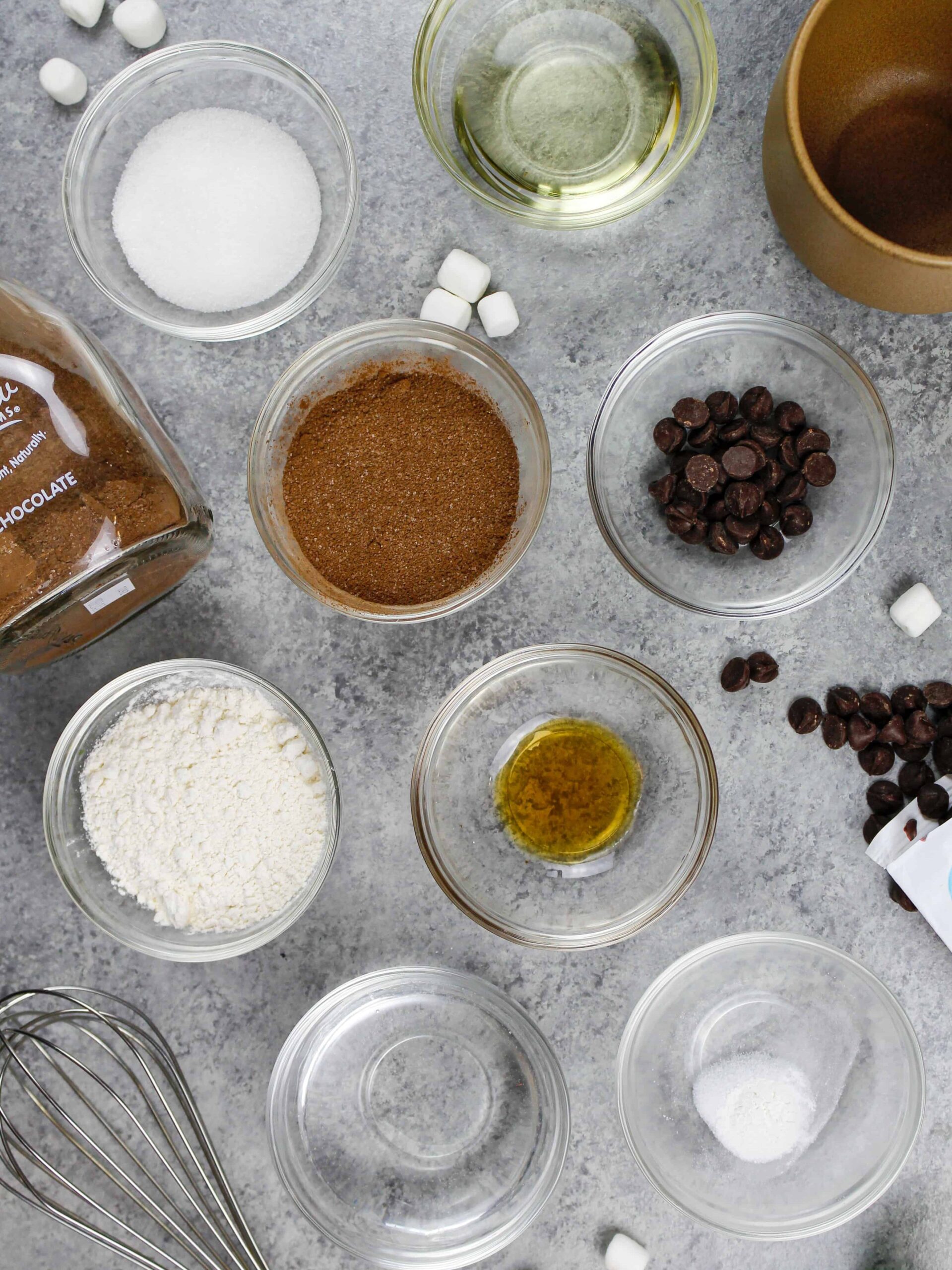 image of ingredients laid out on a counter to make a hot cocoa mug cake
