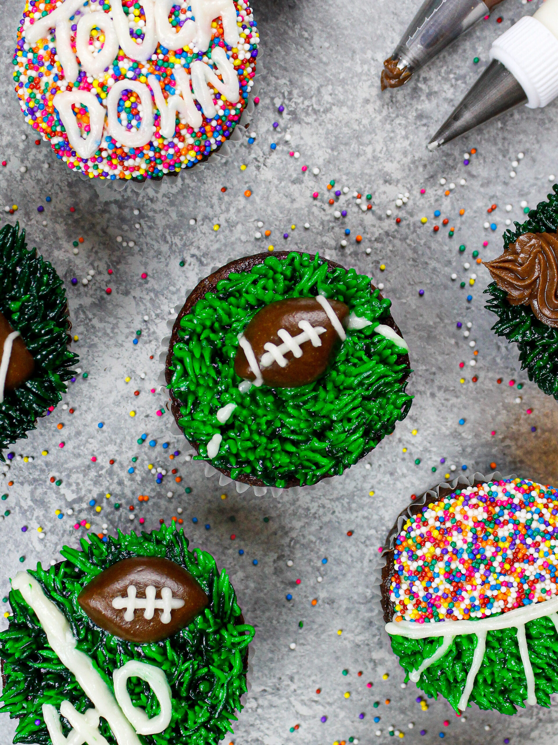 image of a football cupcake decorated to look like a football being thrown