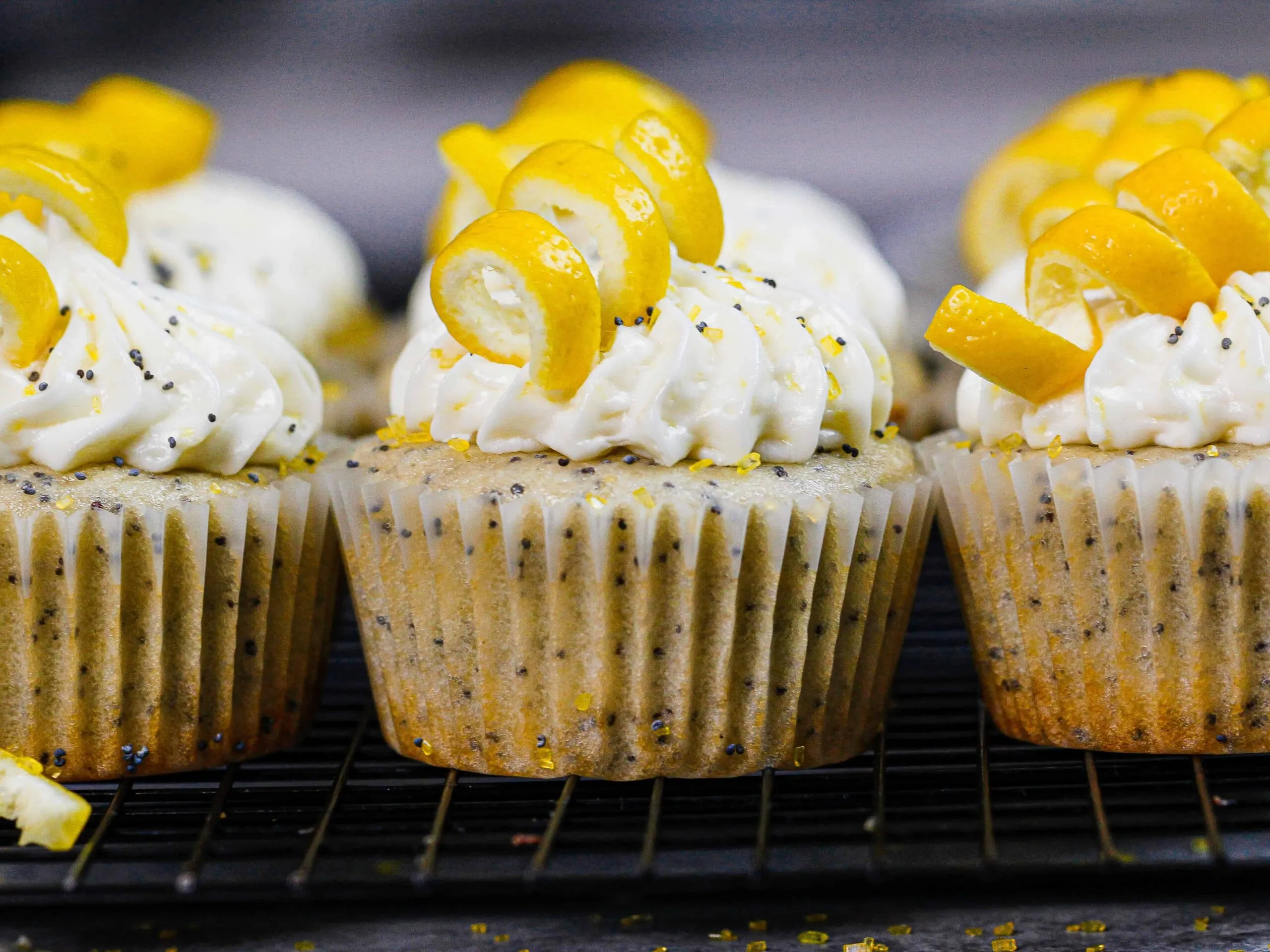 image of lemon poppy seed cupcakes decorated with cream cheese frosting
