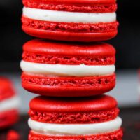 image of red velvet macarons filled with cream cheese frosting