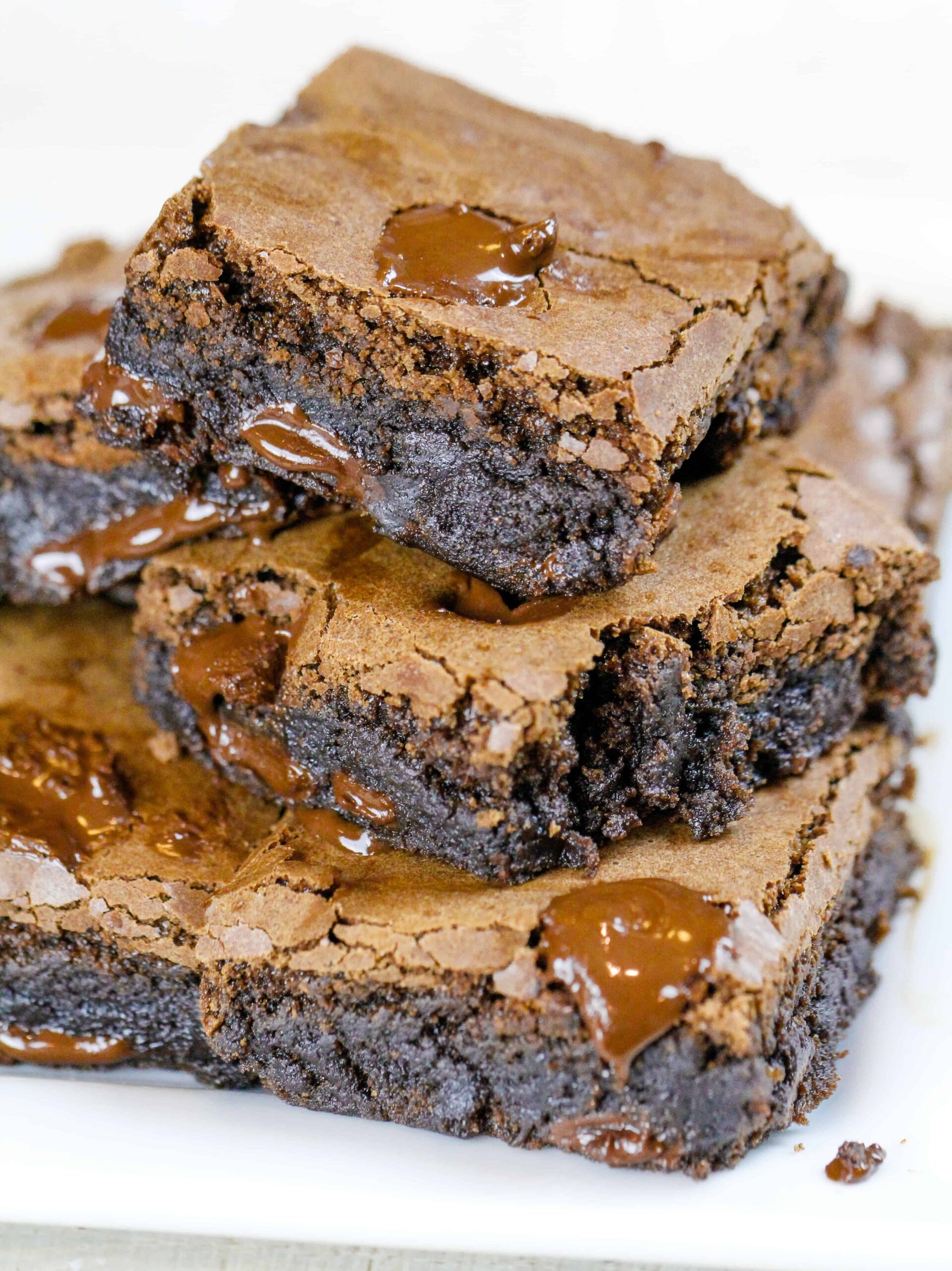 image of dairy free brownies stacked on a plate