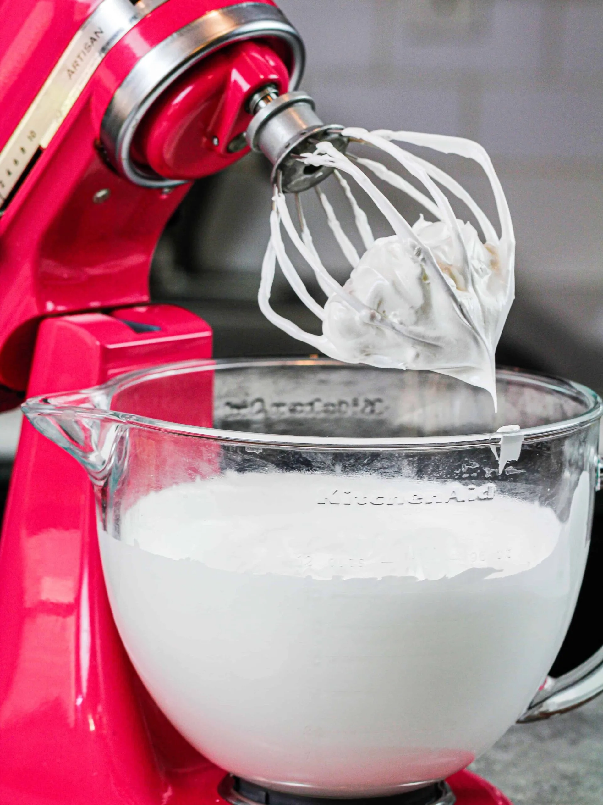 image of sugar free swiss meringue buttercream frosting being made in a kitchen aid mixer