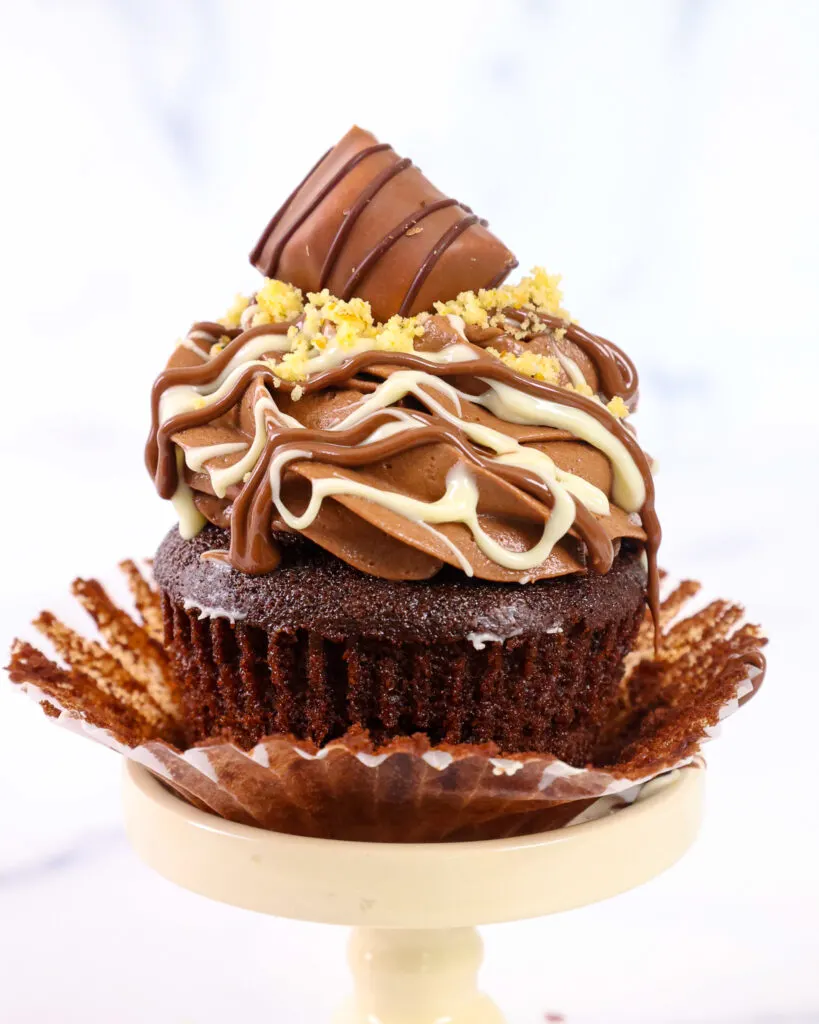 image of a kinder bueno cupcake that's been unwrapped and is ready to be eaten
