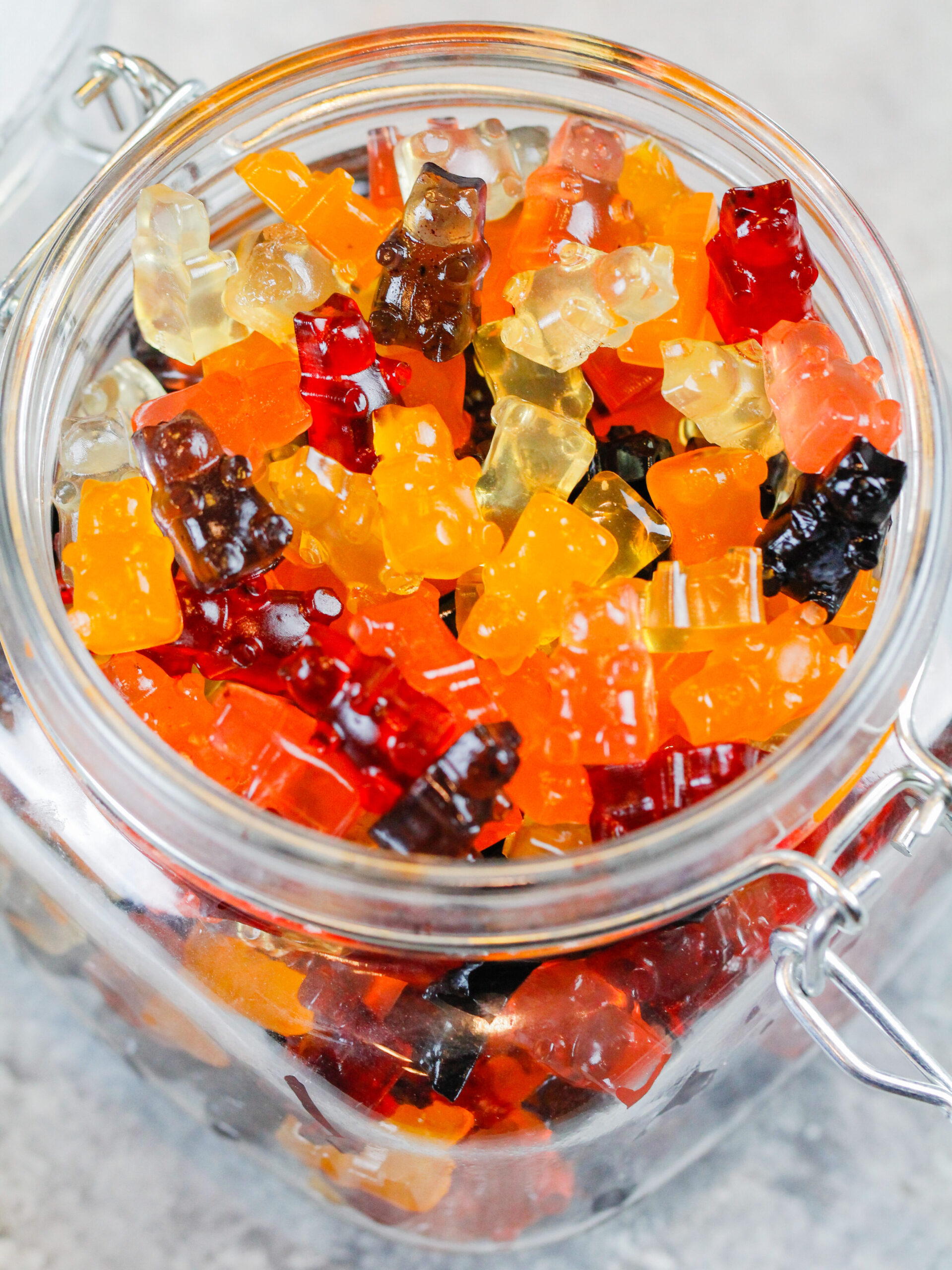 image of homemade healthy gummies stored in an airtight glass container 