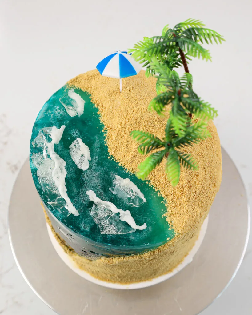 image of a jelly ocean beach cake made to celebrate a summer birthday